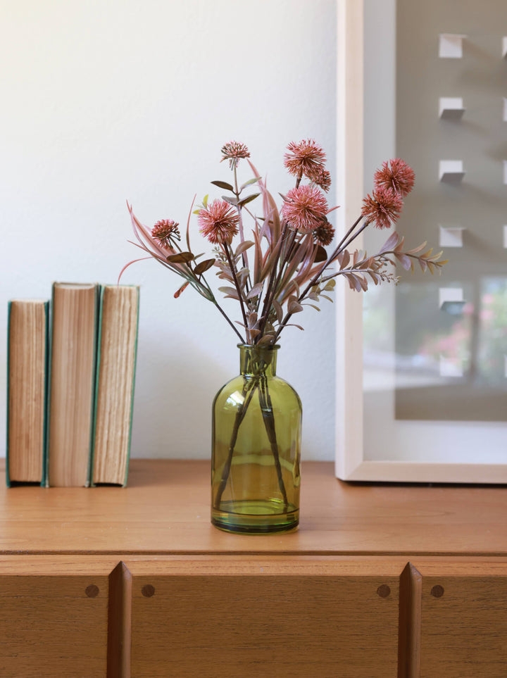 Faux Floral Arrangement in Green Glass Bottle