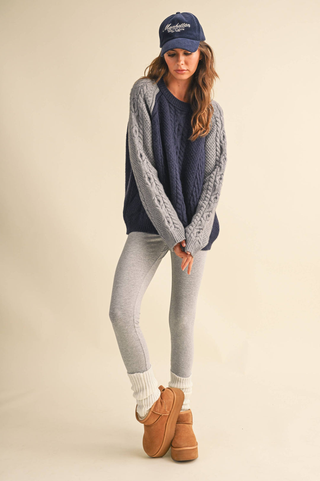 COLOR BLOCK CABLE KNIT SWEATER