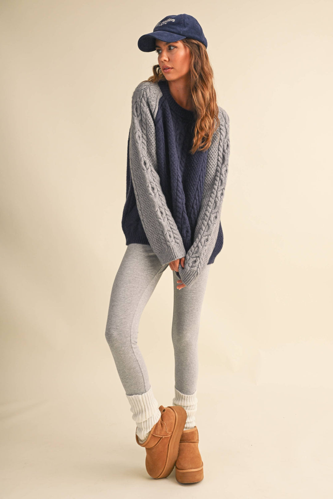 COLOR BLOCK CABLE KNIT SWEATER